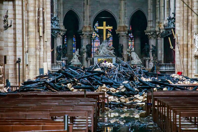 Notre Dame: the damaged interior the day after the fire. Photograph: Christophe Petit Tesson/Pool via New York Times