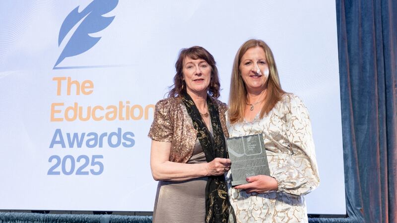 Mary Lyons, director of enterprise, employees and skills at Solas Skills to Advance Initiative, presents the best industry/business - academic collaboration to Órla Morrissey, Drogheda Institute of Further Education